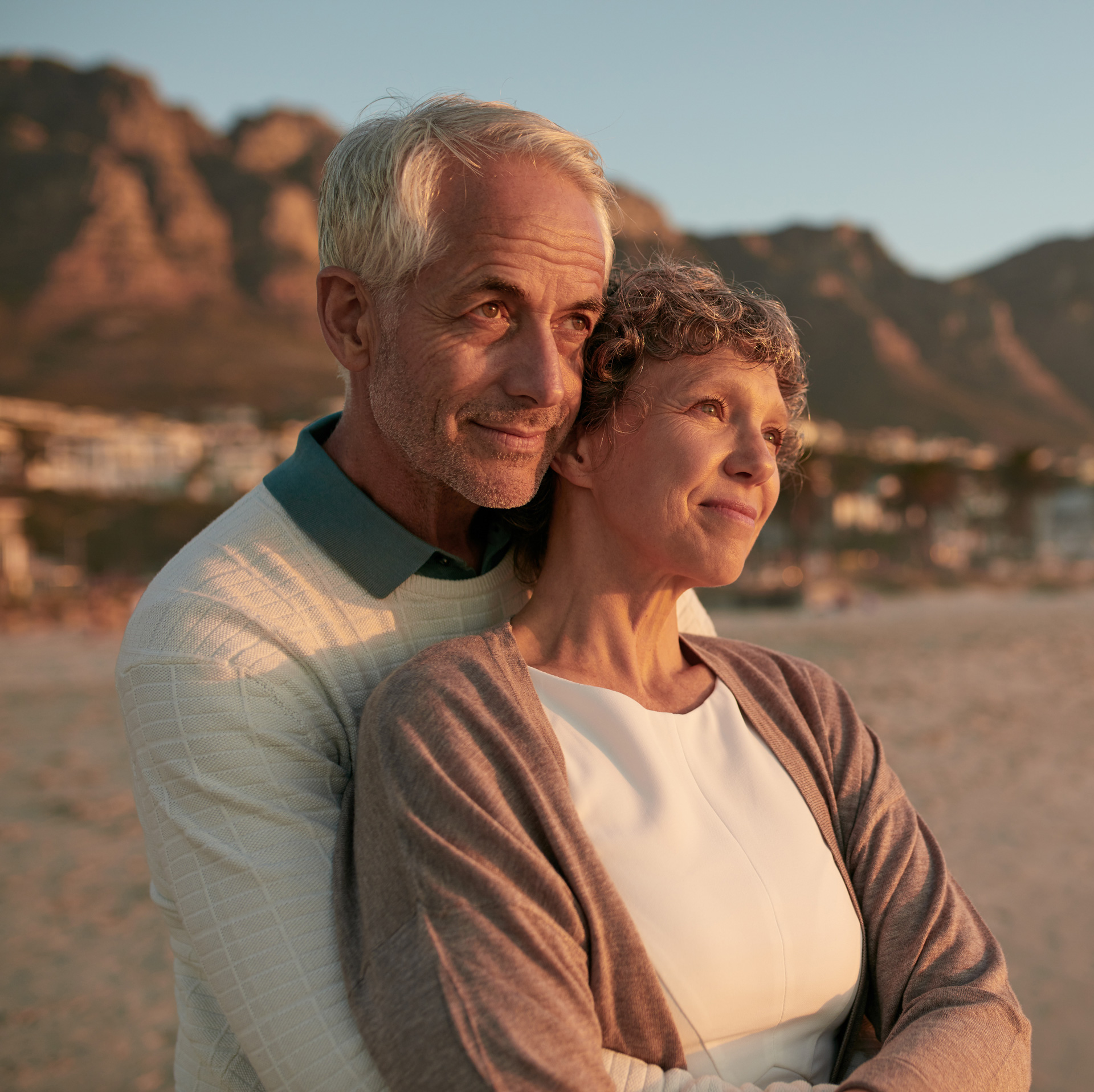 Elderly couple embracing